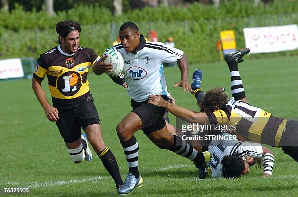 Fidjis Kameli Ratuvou runs with ball during the Rugby World Cup 2007 preparation match between Fidji and Albi, 25 August 2007 in Camares, southern...