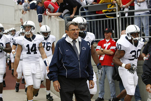 Penn State head coach Joe Paterno leads his team onto the field prior to action between Penn State and Ohio State in Columbus, Ohio on September 23,...