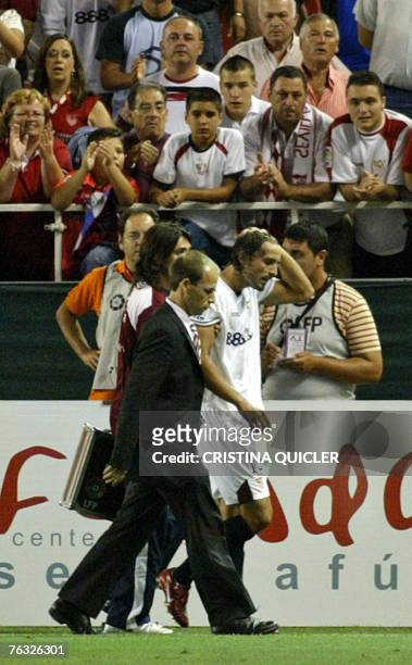 Sevilla's Antonio Puerta leaves the pitch after being tackled seriously by a Getafe football player during their Spanish league football match at the...