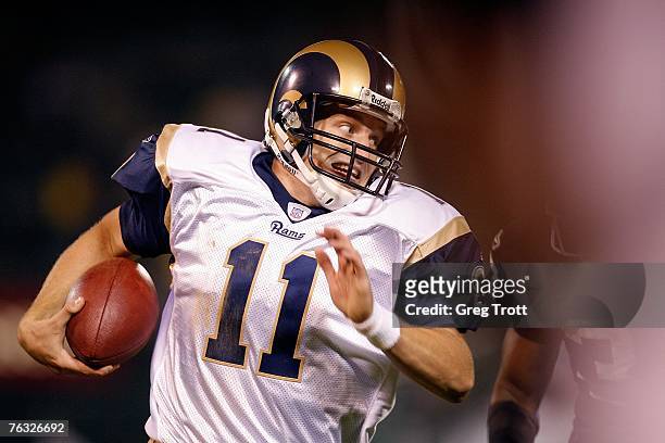 Quarterback Ryan Fitzpatrick of the St. Louis Rams against the Oakland Raiders during a preseason game at McAfee Coliseum on August 24, 2007 in...