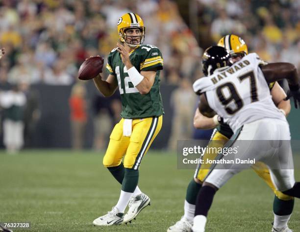 Quarterback Aaron Rodgers of the Green Bay Packers looks to pass the ball during the game against the Jacksonville Jaguars on August 23, 2007 at...