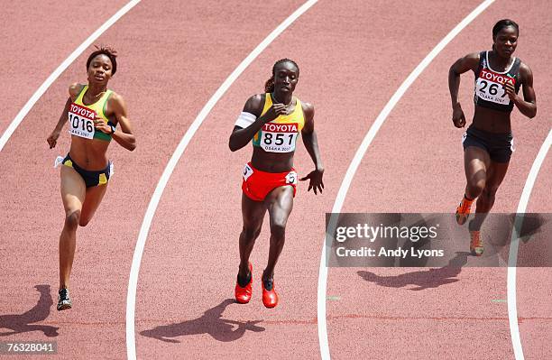 Kineke Alexander of St Vincent, Amy Mbacke Thiam of Senegal and Amantle Montsho of Botswana compete during the Women's 400m heats on day two of the...