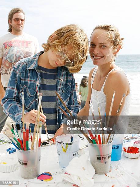 Model Amber Valletta and son Auden McCaw attend the French Connection's "Kids connection to benefit The Art Of Elysium" on August 25, 2007 in Malibu,...