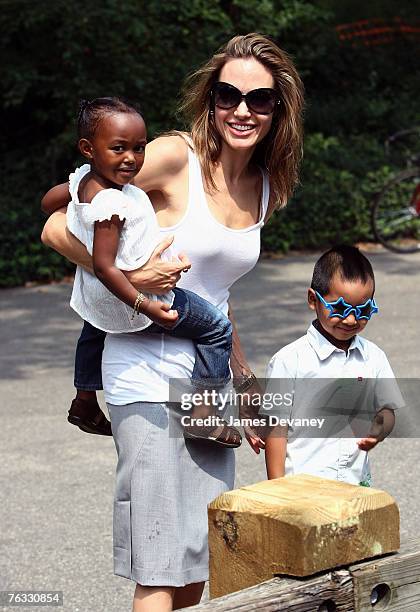 Zahara Jolie-Pitt, Angelina Jolie and Maddox Jolie-Pitt visit the Central Park Carousel in New York City on August 25, 2007.