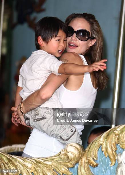 Angelina Jolie and Pax Jolie-Pitt visit the Central Park Carousel in New York City on August 25, 2007.