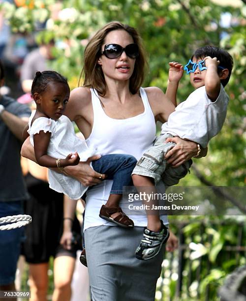 Zahara Jolie-Pitt, Angelina Jolie and Pax Jolie-Pitt visit the Central Park Carousel in New York City on August 25, 2007.