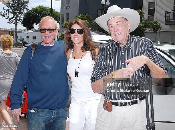 Poker Star Chip Reese , Donna Baldwin and Poker Star Doyle Brunson pose at day two of the Ivy Hotel Premiere on August 25, 2007 in San Diego,...