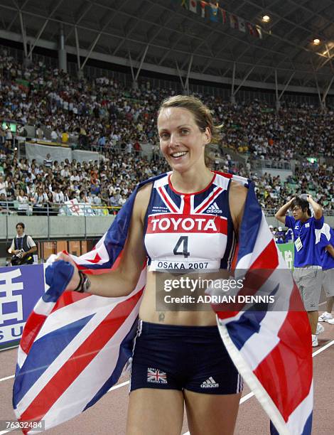 Britian's Kelly Sotherton celebrates after the women?s heptathlon 800M at the 11th IAAF World Athletics Championships in Osaka, 26 August 2007....