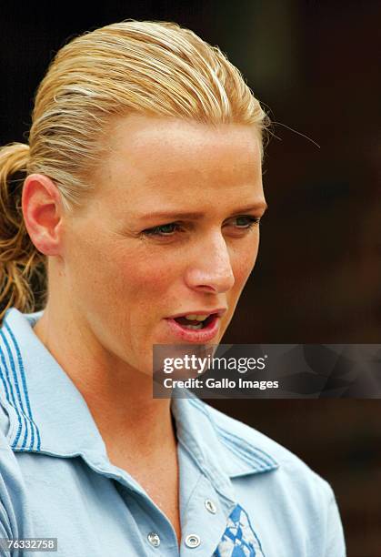 Swimmer Charlene Wittstock coaches children during a training session on December 2, 2006 in Richards Bay, South Africa.