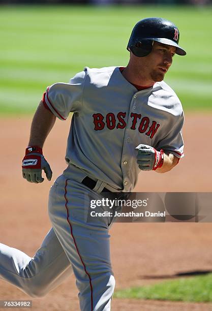 Drew of the Boston Red Sox runs the bases after hitting a solo home run in the second inning against the Chicago White Sox at U.S. Cellular Field...