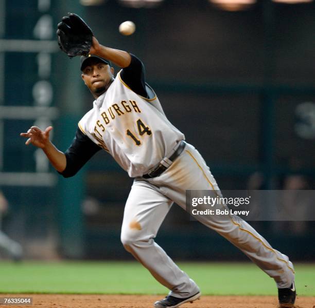 Jose Castillo of the Pittsburgh Pirates knocks down a hard hit ball by Mark Loretta of the Houston Astros in the eighth inning on August 26, 2007 at...