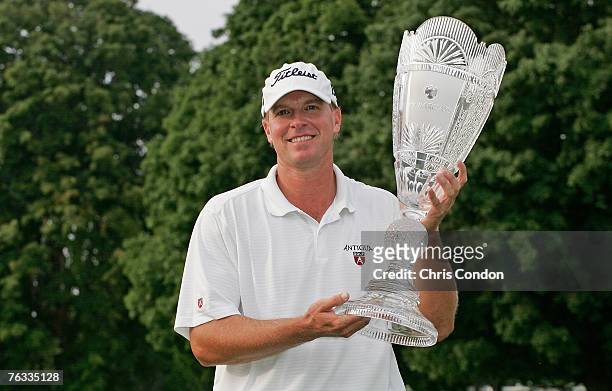 Steve Stricker holds the champion's trophy after winning the The Barclays held at Westchester Country Club August 26, 2007 in Harrison, New York.