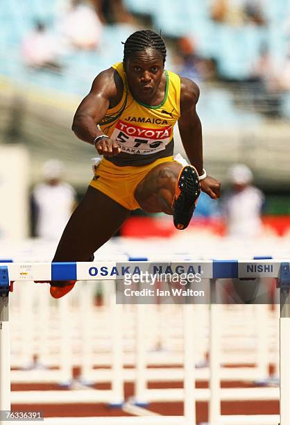 Delloreen Ennis-London of Jamaica competes during the Women's 100m Hurdles heats on day three of the 11th IAAF World Athletics Championships on...