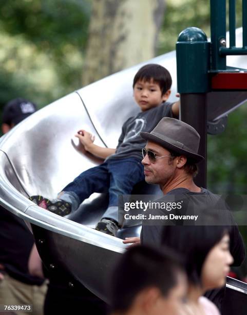 Brad Pitt visits playground with children Zahara Jolie-Pitt, Pax Jolie-Pitt and Maddox Jolie-Pitt in New York City on August 26, 2007.