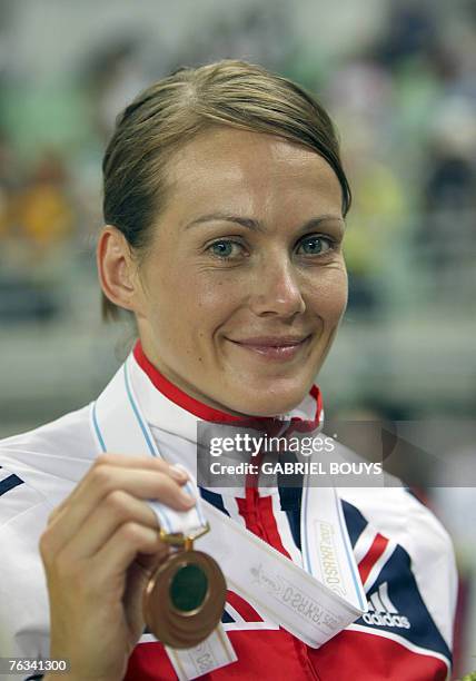 Britian's bronze medalist Kelly Sotherton poses during the women's heptathlon medal ceremony, 27 August 2007, at the 11th IAAF World Athletics...