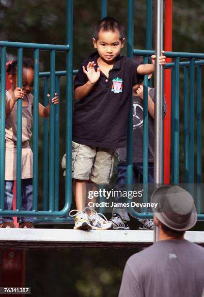 Brad Pitt visits playground with children Zahara Jolie-Pitt, Pax Jolie-Pitt and Maddox Jolie-Pitt in New York City on August 26, 2007.