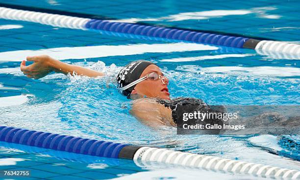 Swimmer Elzanne Werth swims during a training session with Charlene Wittstock on December 2, 2006 in Richards Bay, South Africa.