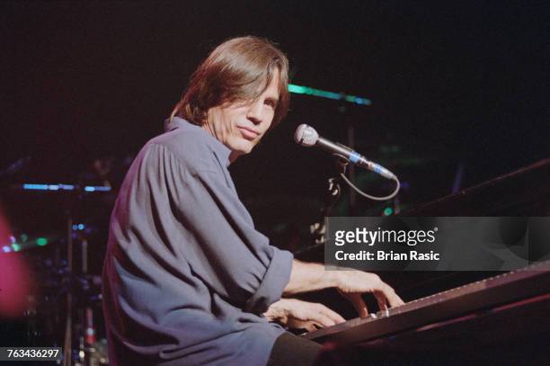 American singer-songwriter and musician Jackson Browne performs live at the piano on stage at the Royal Albert Hall in London in June 1994.