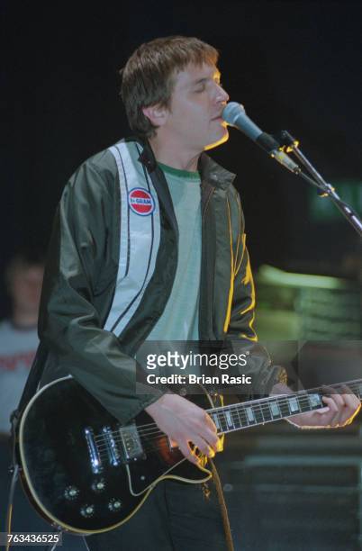 American musician and guitarist Evan Dando of The Lemonheads performs live on stage playing a Gibson Les Paul guitar in London in June 1994.