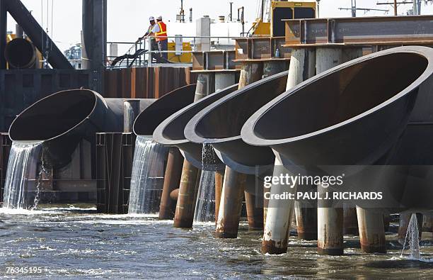Some of the new exhaust pipes at the US Army Corp's of Engineers 17th St. Canal Outfall Canal in New Orleans 27 August 2007 which remove rising...