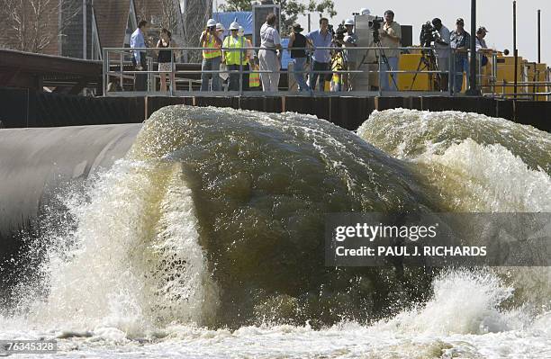 Two of the new exhaust pipes at the US Army Corp's of Engineers 17th St. Canal Outfall Canal in New Orleans 27 August 2007, blast out water out of...