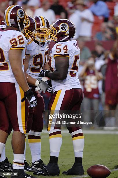 Linebacker H.B. Blades of the Washington Redskins calls out the defensive signals during drills prior to a preseason game on August 18, 2007 against...