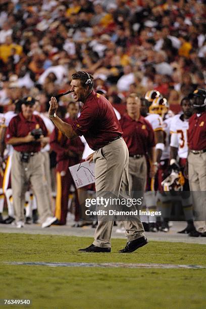 Assistant head coach-defense Gregg Williams yells out instructions during a preseason game on August 18, 2007 against the Pittsburgh Steelers at...