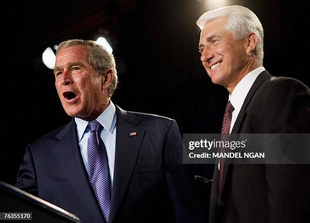 Representative David Reichert , R-WA, smiles after introducing US President George W. Bush at a fundraiser for Reichert and the Washington State...