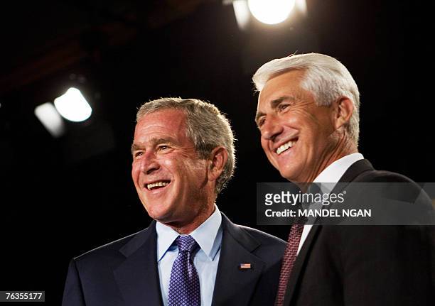 Representative David Reichert , R-WA, smiles after introducing US President George W. Bush at a fundraiser for Reichert and the Washington State...