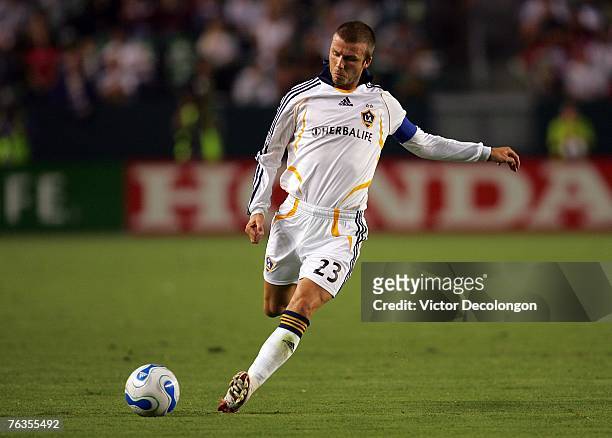 David Beckham of the Los Angeles Galaxy takes a free kick in the first half of their MLS match against CD Chivas USA at the Home Depot Center on...