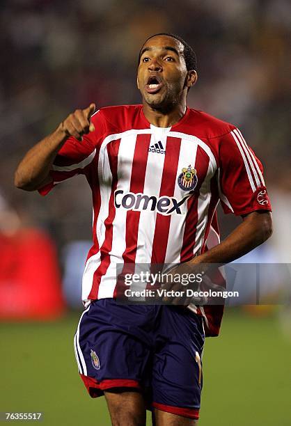 Maykel Galindo of CD Chivas USA points to the stands as he celebrates one of his second half goals against the Los Angeles Galaxy during their MLS...