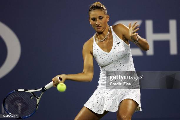 Tatiana Golovin of France returns to Ahsha Rolle during day one of the U.S. Open at the Billie Jean King National Tennis Center on August 27, 2007 in...