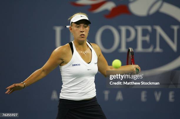 Angelique Kerber of Germany hits a return against Serena Williams during day one of the U.S. Open at the Billie Jean King National Tennis Center on...