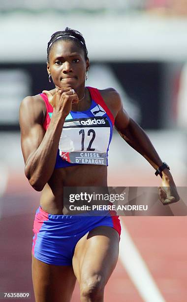 French Muriel Hurtis-Houairi competes in the women 200m final, 05 August 2007, in Niort, western France, during the French Athletics Championships....