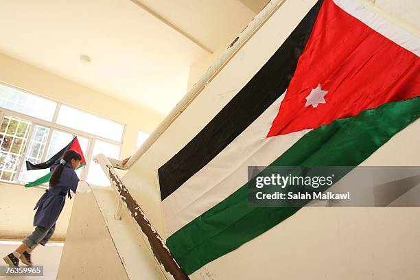 An Iraqi refugee student walks upstairs at the Shmeisani elementary school on August 28, 2007 in Amman, Jordan. Ellen Sauerbery, Assistant- Secretary...