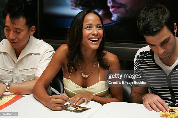 Actors James Kyson Lee, Dania Ramirez and Zachary Quinto sign autographs for fans at the NBC Universal celabration for the DVD realease of "Heroes:...