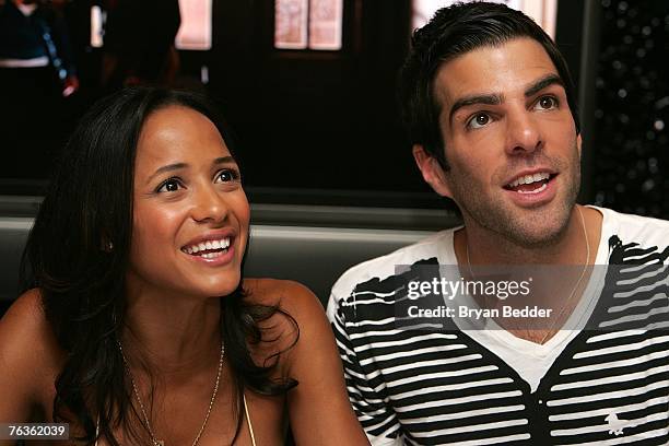 Actors Dania Ramirez and Zachary Quinto attend the NBC Universal celabration for the DVD realease of "Heroes: Season 1" at the NBC Experience store...