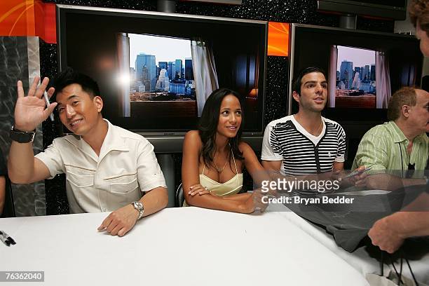 Actors James Kyson Lee, Dania Ramirez and Zachary Quinto sign autographs for fans at the NBC Universal celabration for the DVD realease of "Heroes:...