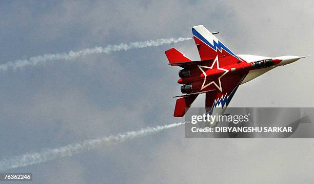In this file photograph dated 11 February 2007, a Russian-made MiG-35 flies past during the final day of the Aero India 2007 at the Yelahanka Air...