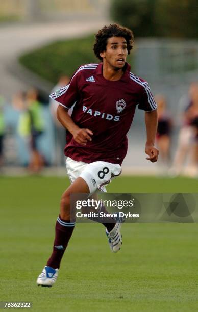 Midfielder Mehdi Ballouchy of the Colorado Rapids eyes the play against the Los Angeles Galaxy in the Major League Soccer game on August 26, 2007 at...