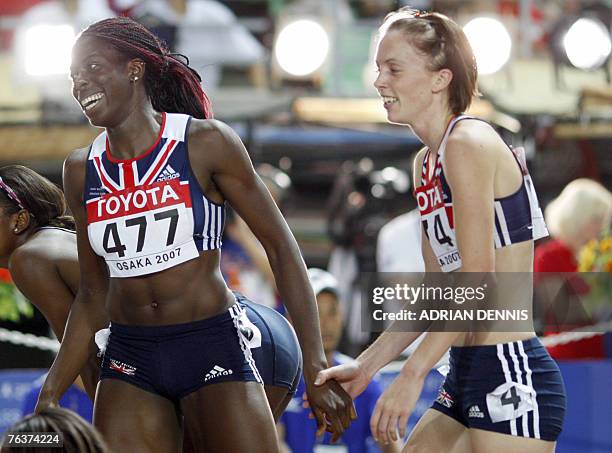 Britain's Christine Ohuruogu and Britain's Nicola Sanders celebrate after the women's 400m final, 29 August 2007, at the 11th IAAF World Athletics...