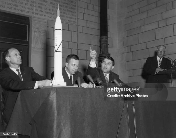 The panel of scientists who developed the first successful US orbiting satellite, the Explorer I, hold a press conference at the National Academy of...