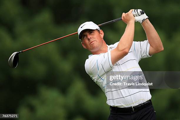 Justin Leonard watches his tee shot on the 12th hole during the first round of The Barclays, the inaugural event of the new FedEx Cup Playoffs at...