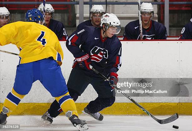 Patrick Kane of Team USA Blue skates against Kristofer Berglund of Team Sweden during an exhibition game on August 8, 2007 at the 1980 Rink Herb...