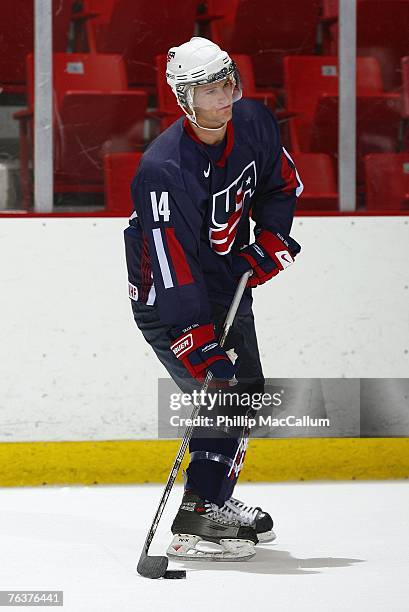 Brian Day of Team USA Blue skates against Team Sweden during an exhibition game on August 8, 2007 at the 1980 Rink Herb Brooks Arena in Lake Placid,...