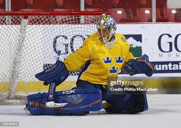 Goaltender Eddie Lack of Team Sweden defends his net against Team USA Blue during an exhibition game on August 8, 2007 at the 1980 Rink Herb Brooks...