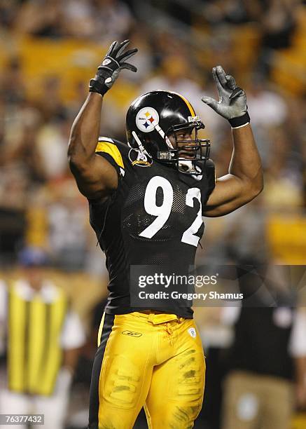 James Harrison of the Pittsburgh Steelers gestures against the Philadelphia Eagles during the NFL preseason game on August 26, 2007 at Heinz Field in...