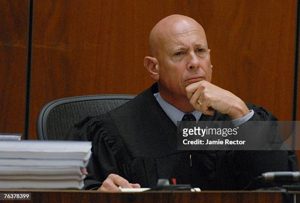 Judge Larry Paul Fidler listens to the defense and prosecution debate over jury instructions during Music producer Phil Spector's murder trial at the...