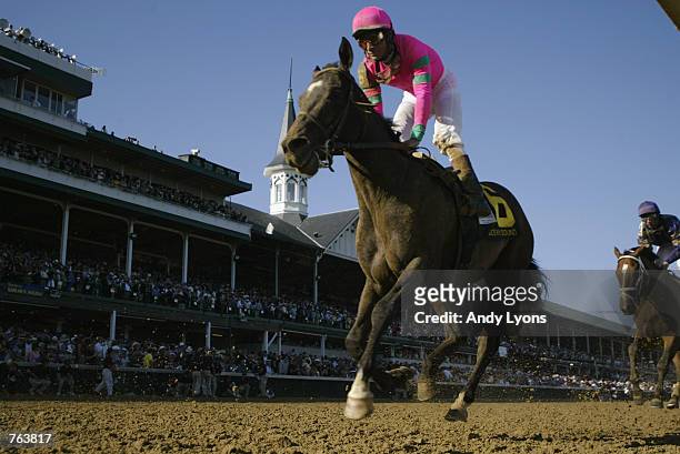 Ocean Sound under jockey Alex Solis races downfield during the 128th Kentucky Derby at Churchill Downs on May 4, 2002 in Louisville, Kentucky.