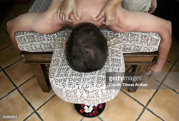 British tourist receives a massage during a spa treatment at Bali Tropical Spa on August 29, 2007 in Bali, Indonesia. Bali now has the highest...